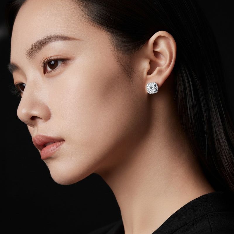 Model wearing round halo stud earrings