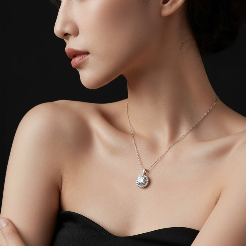 Model wearing round halo pendant