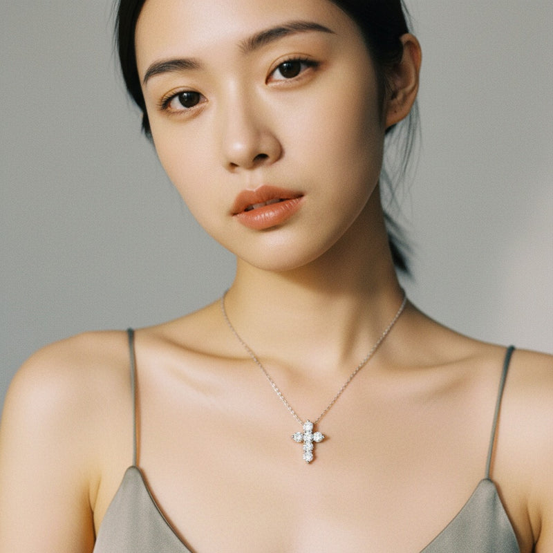 Model wearing round cross pendant