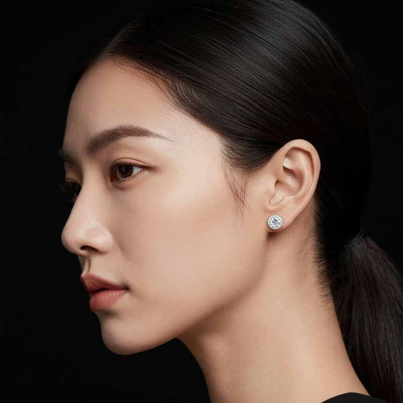 Model wearing round halo stud earrings