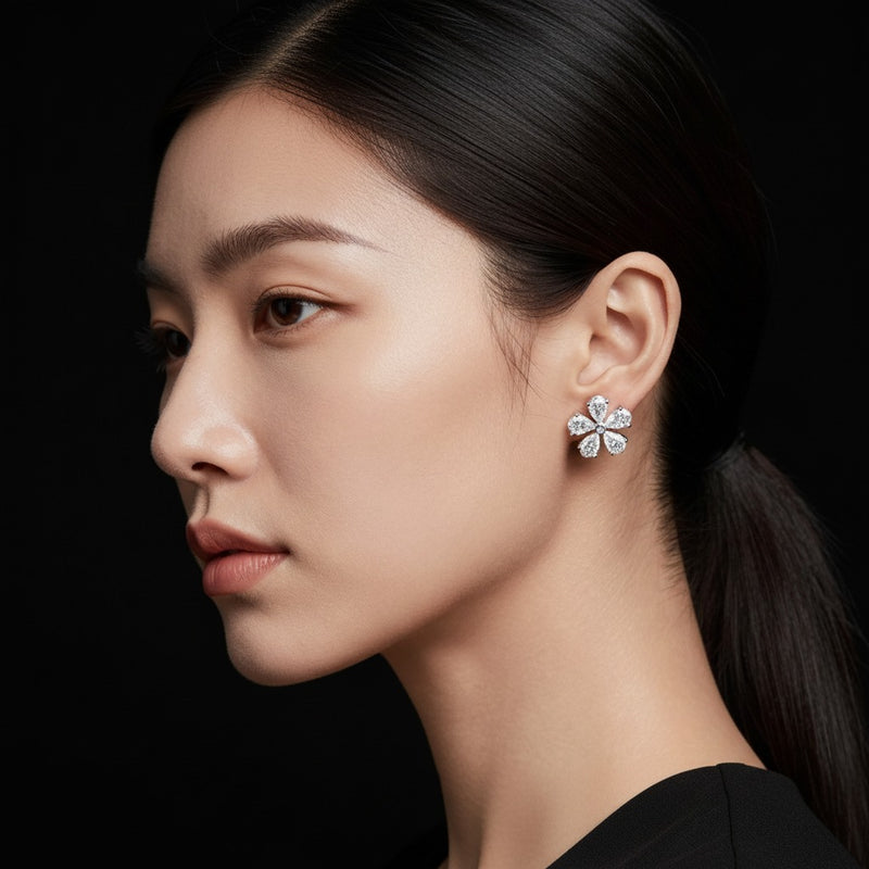 Model wearing pear floral earrings