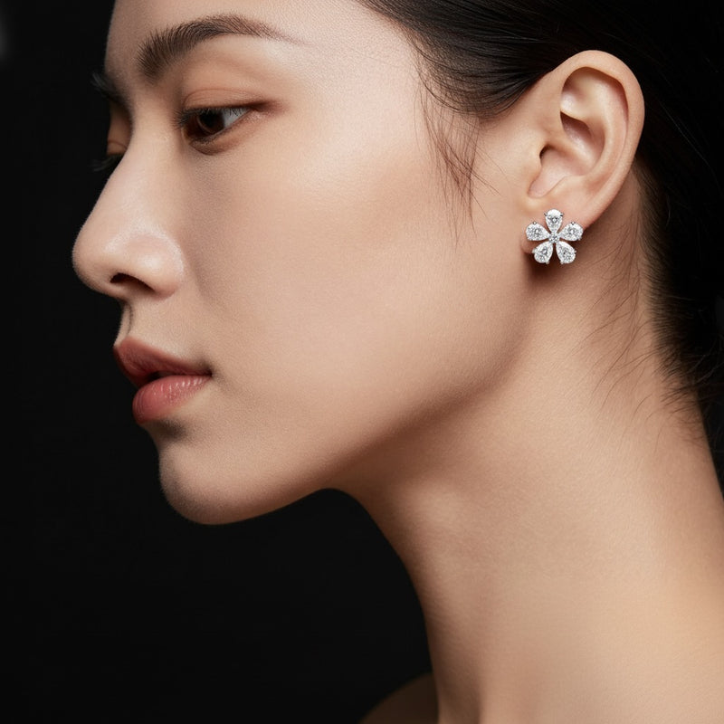 Model wearing pear floral earrings