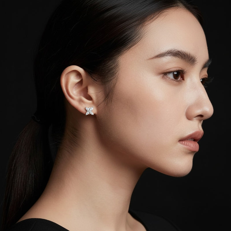 Model wearing marquise flower earrings