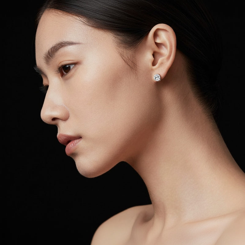 Model wearing round classic basket set stud earrings