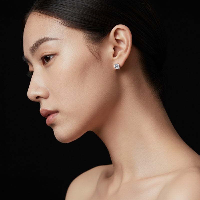 Model wearing round classic basket set stud earrings
