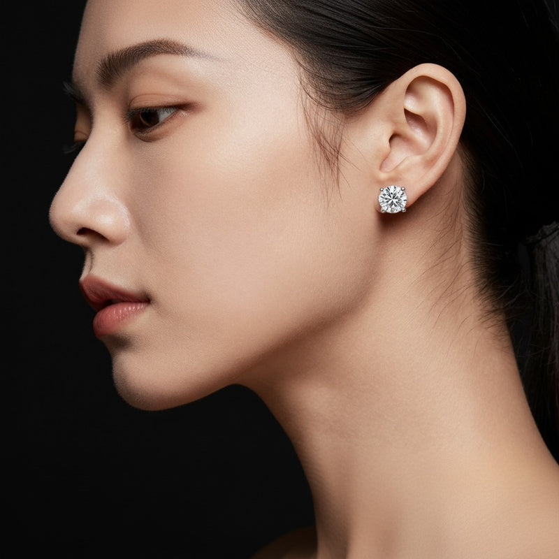 Model wearing round hidden halo stud earrings