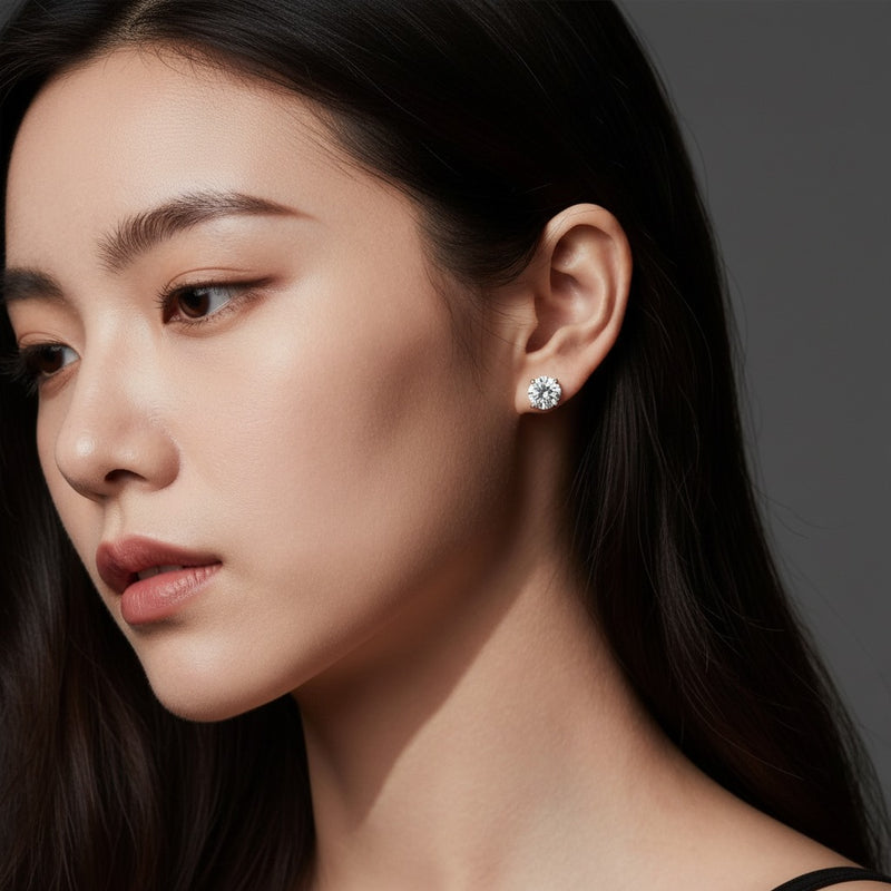 Model wearing round hidden halo stud earrings