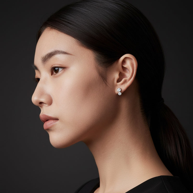 Model wearing round hidden halo stud earrings