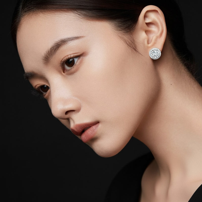 Model wearing round hidden halo stud earrings