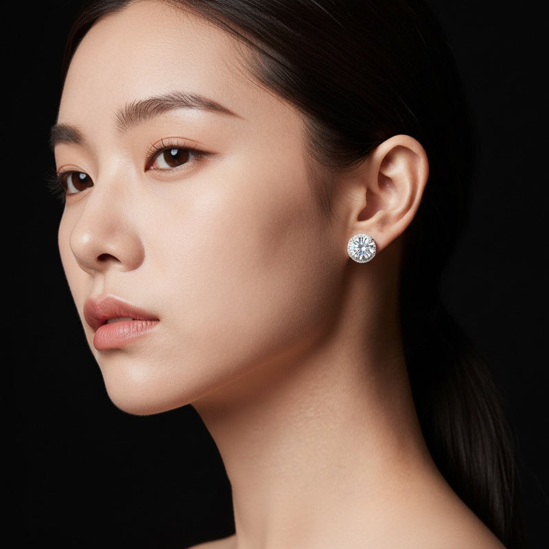 Model wearing round hidden halo stud earrings