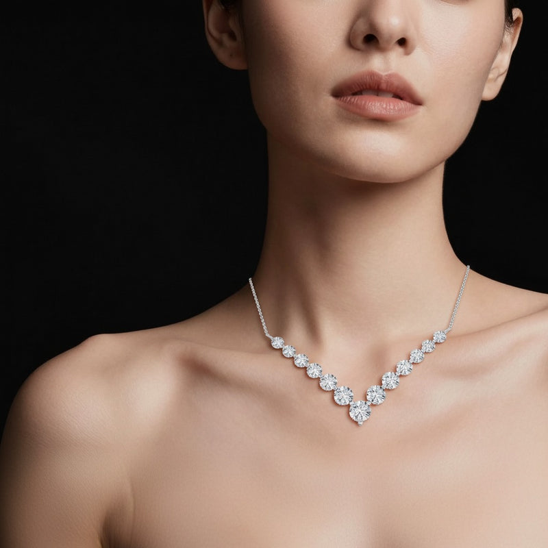Model wearing round graduating v necklace