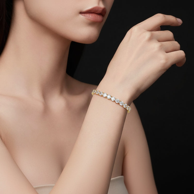 Model wearing oval tennis bracelet