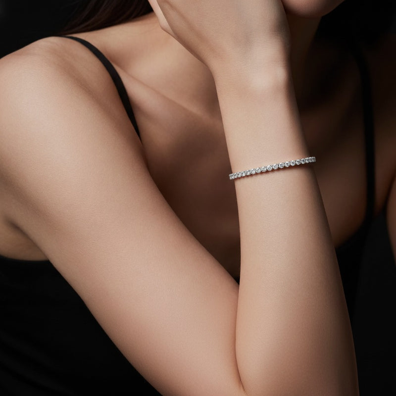 Model wearing round tennis bracelet