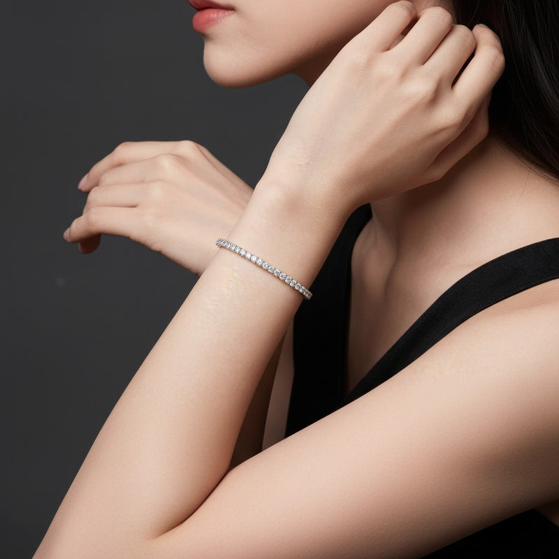Model wearing round tennis bracelet