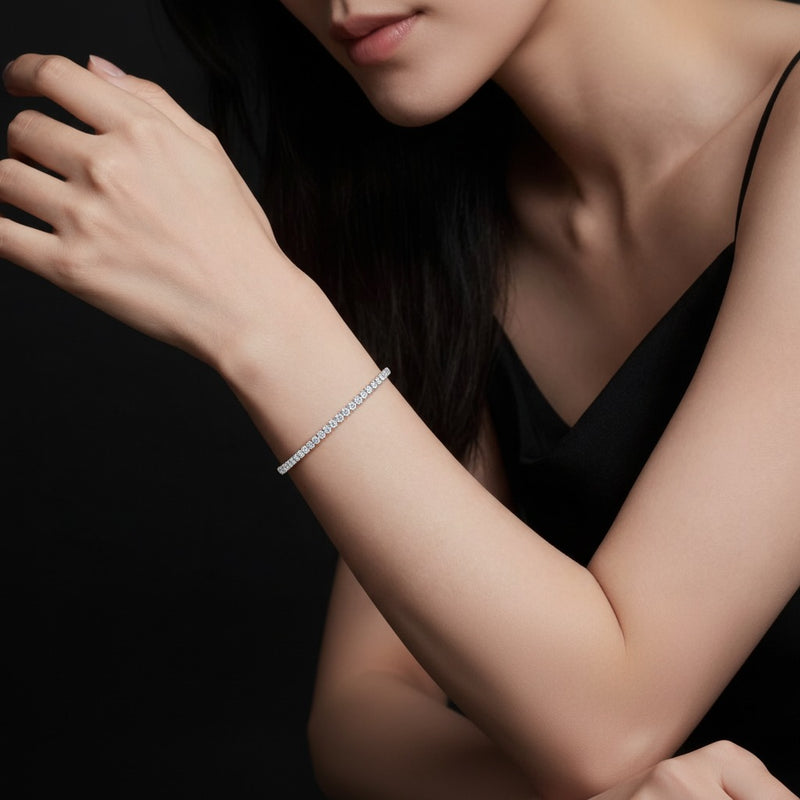 Model wearing round tennis bracelet
