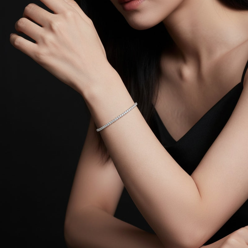 Model wearing round tennis bracelet