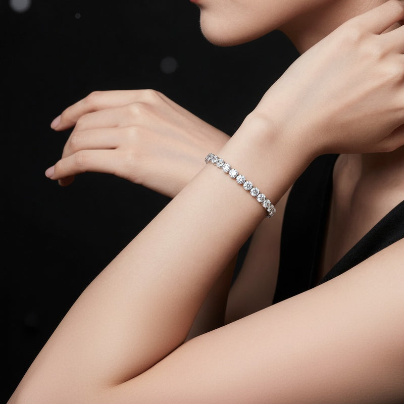 Model wearing oval tennis bracelet