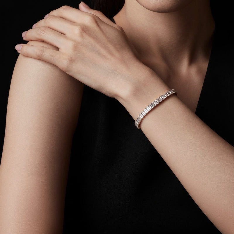 Model wearing emerald east west line bracelet