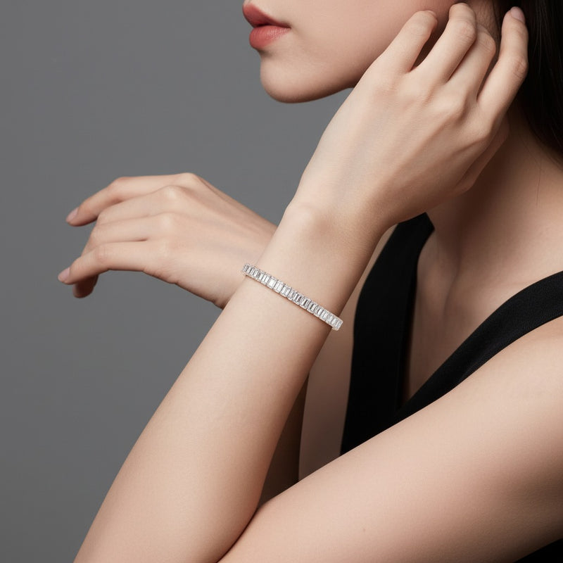 Model wearing emerald east west line bracelet