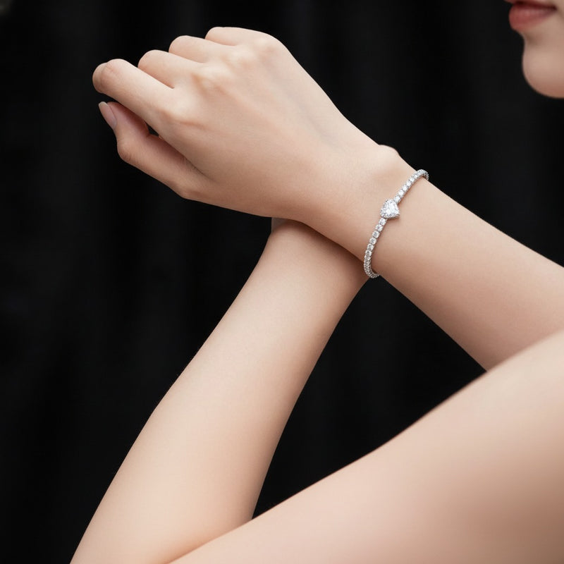 Model wearing pear east west station bracelet
