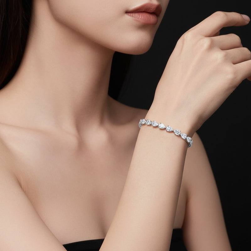 Model wearing pear fancy line bracelet