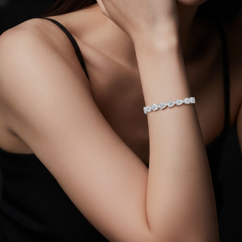Model wearing pear east west bracelet