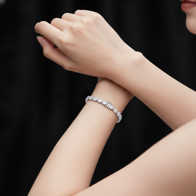 Model wearing pear fancy line bracelet