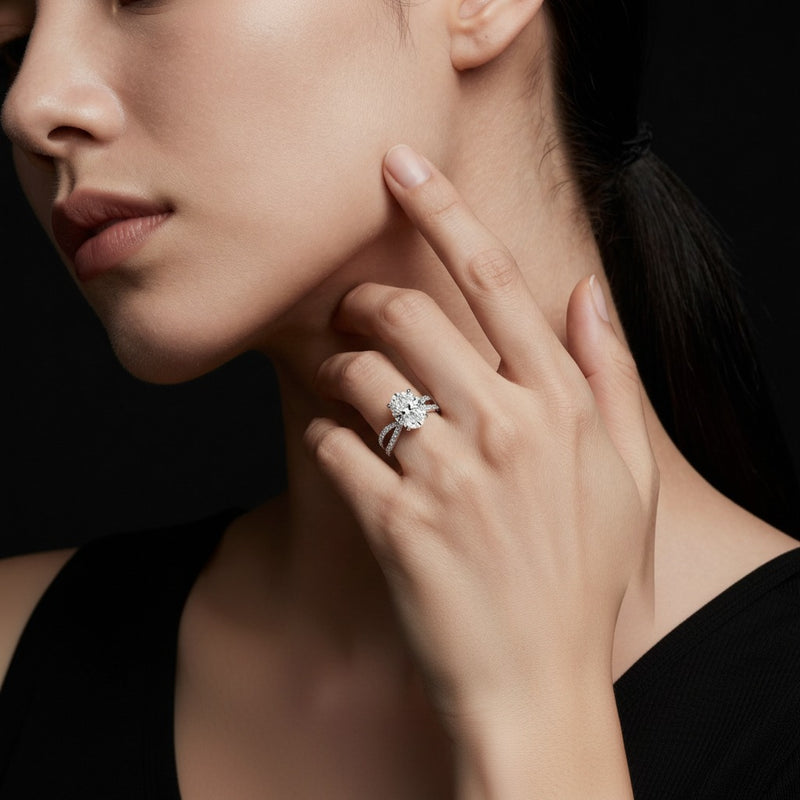 Model wearing oval cross shank accented engagement ring