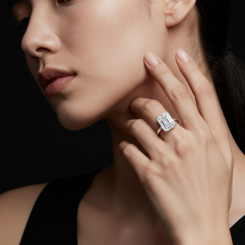 Model wearing cushion hidden halo plain shank engagement ring
