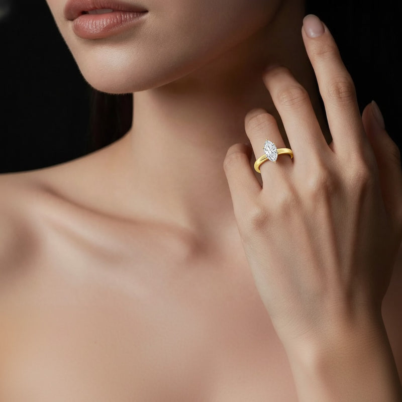 Model wearing marquise hidden halo plain shank engagement ring