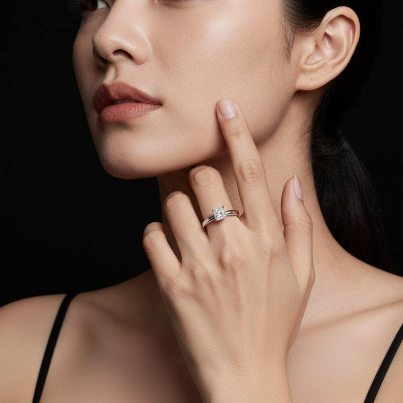 Model wearing princess hidden halo plain shank engagement ring