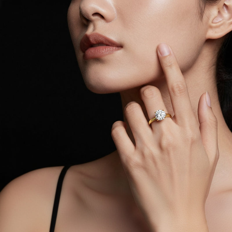 Model wearing round hidden halo plain shank engagement ring