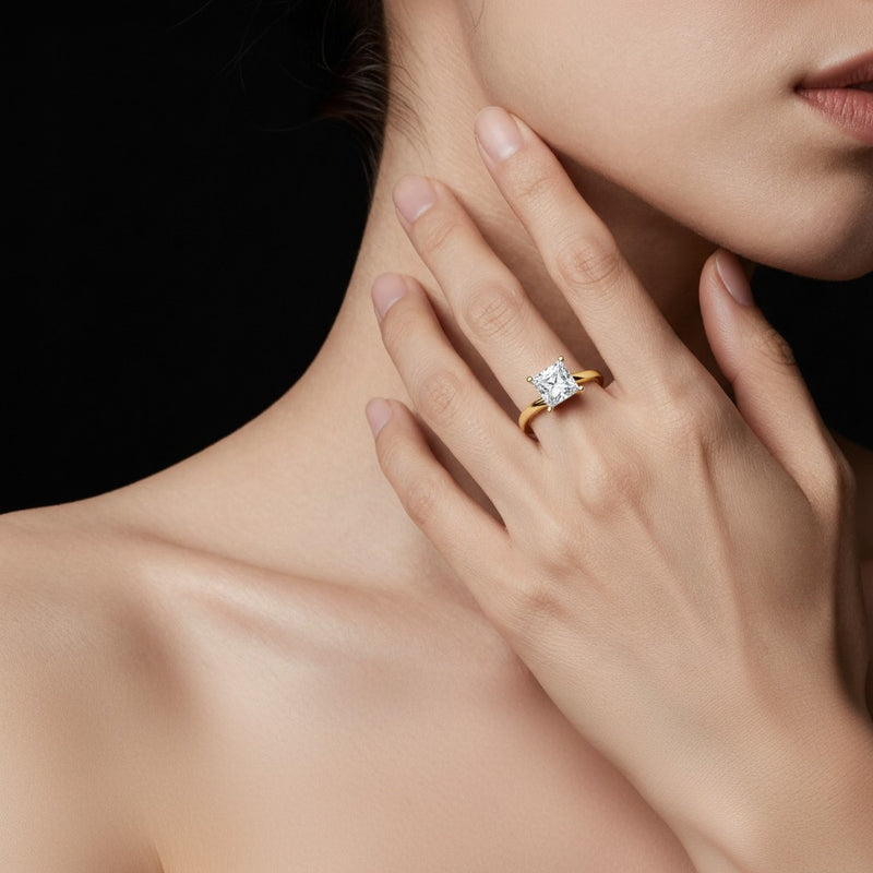 Model wearing princess bypass shank engagement ring