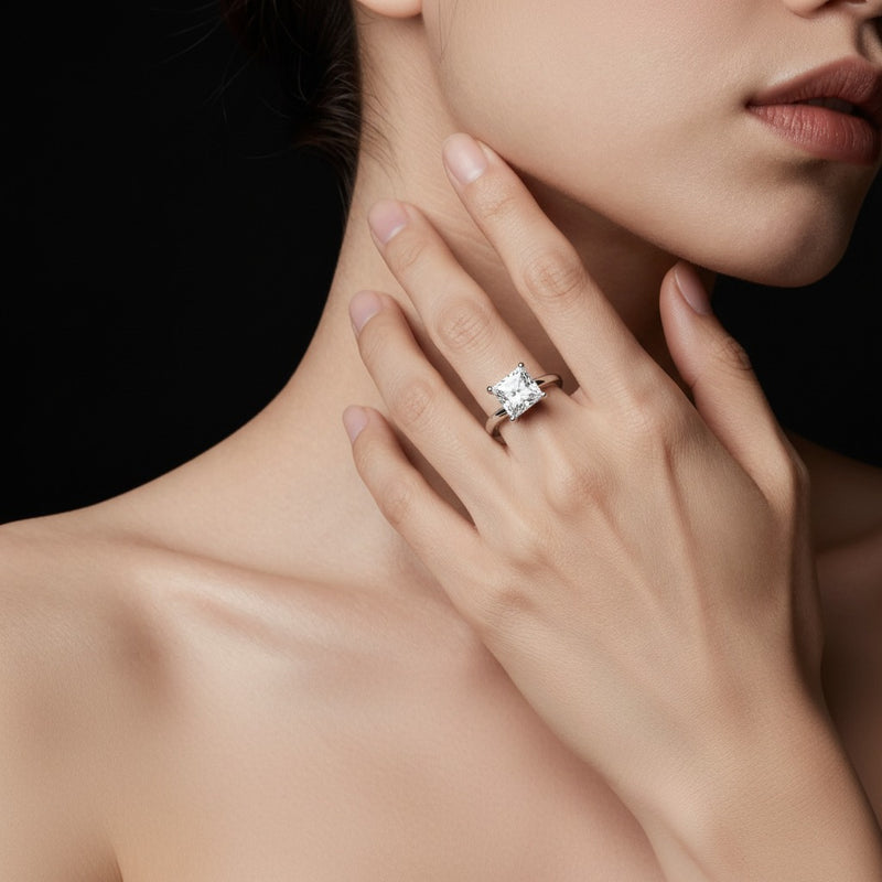 Model wearing princess bypass shank engagement ring