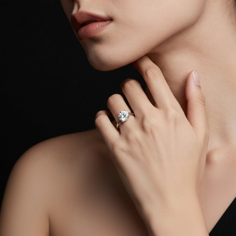 Model wearing round bypass shank engagement ring