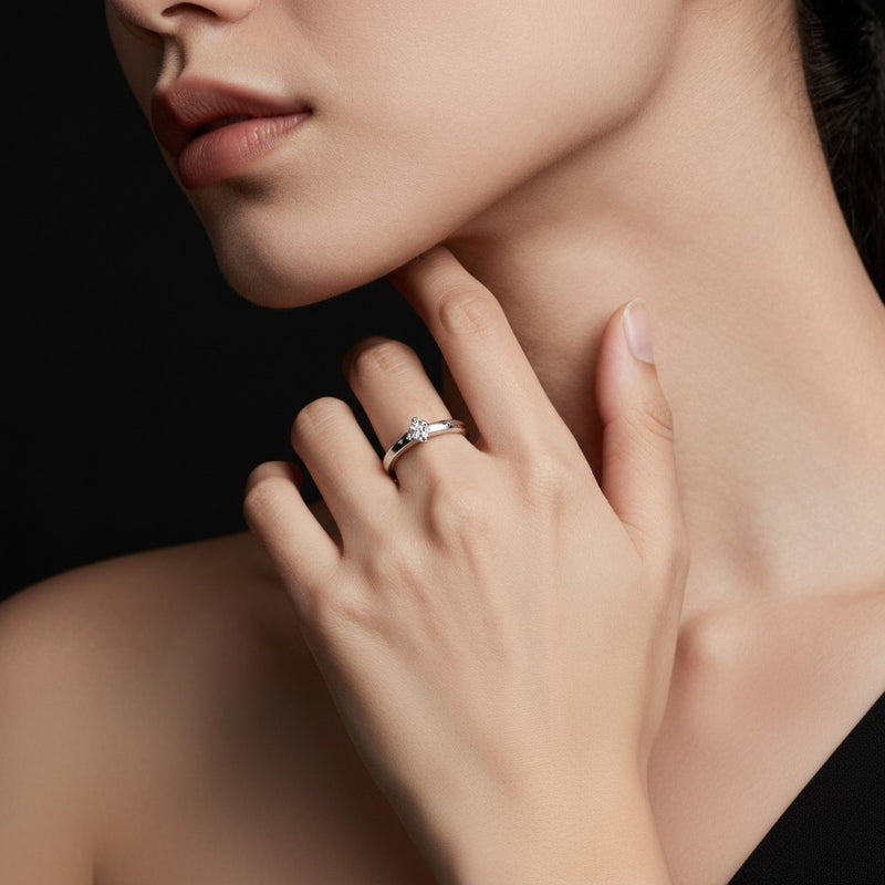 Model wearing round bypass shank engagement ring