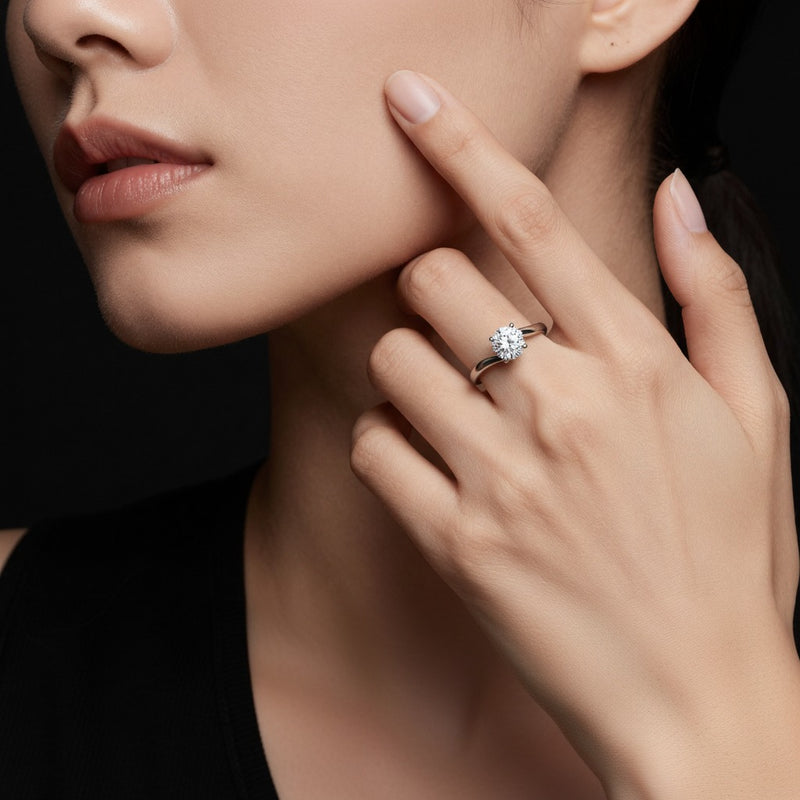 Model wearing round bypass shank engagement ring