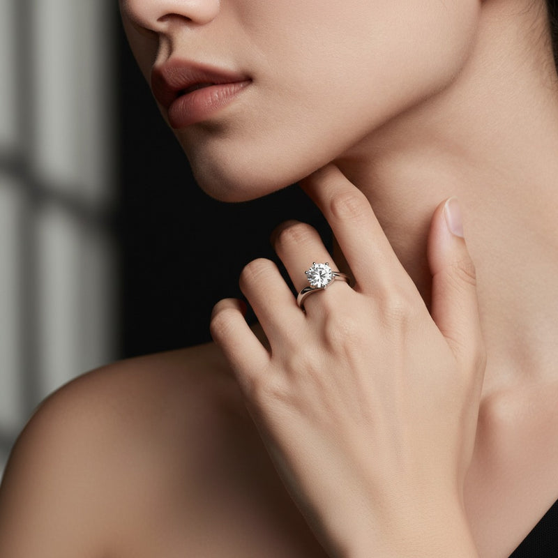 Model wearing round bypass shank engagement ring
