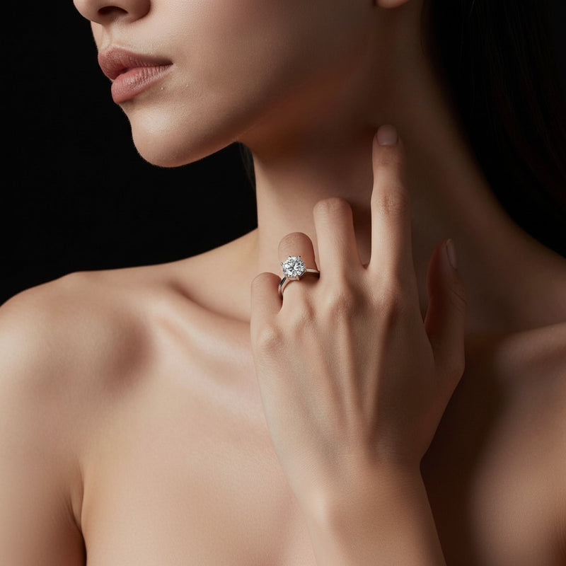 Model wearing round bypass shank engagement ring
