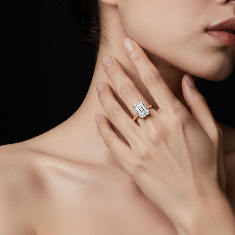 Model wearing radiant hidden halo cathedral shank engagement ring