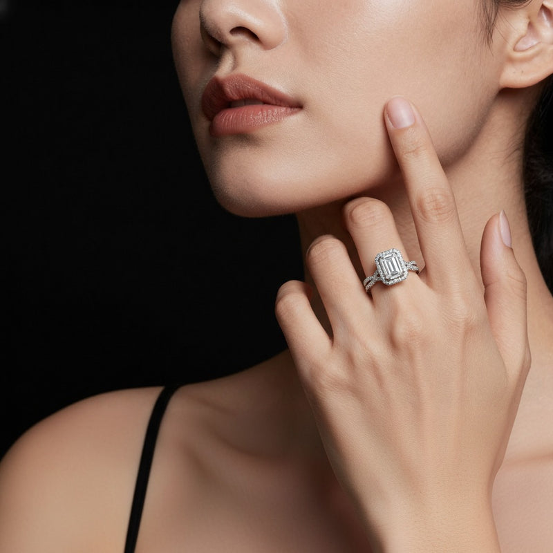 Model wearing emerald ring