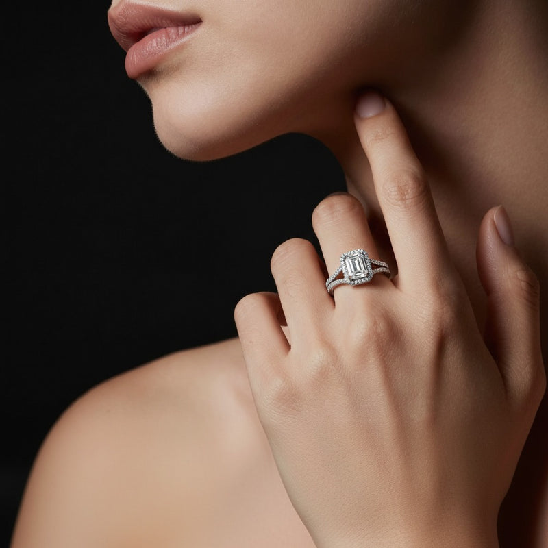Model wearing emerald split shank accented ring