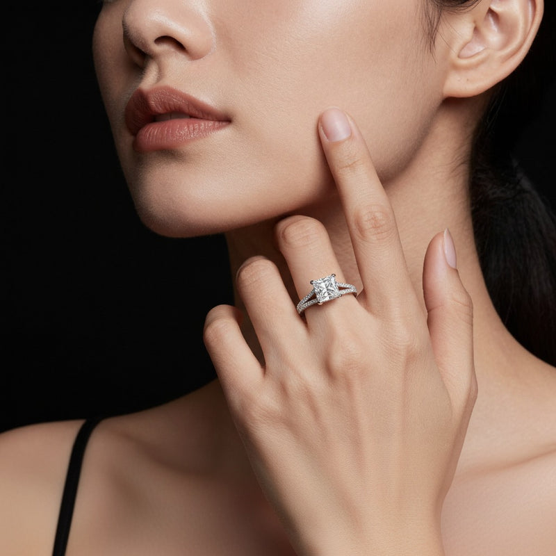 Model wearing princess split shank trellis engagement ring
