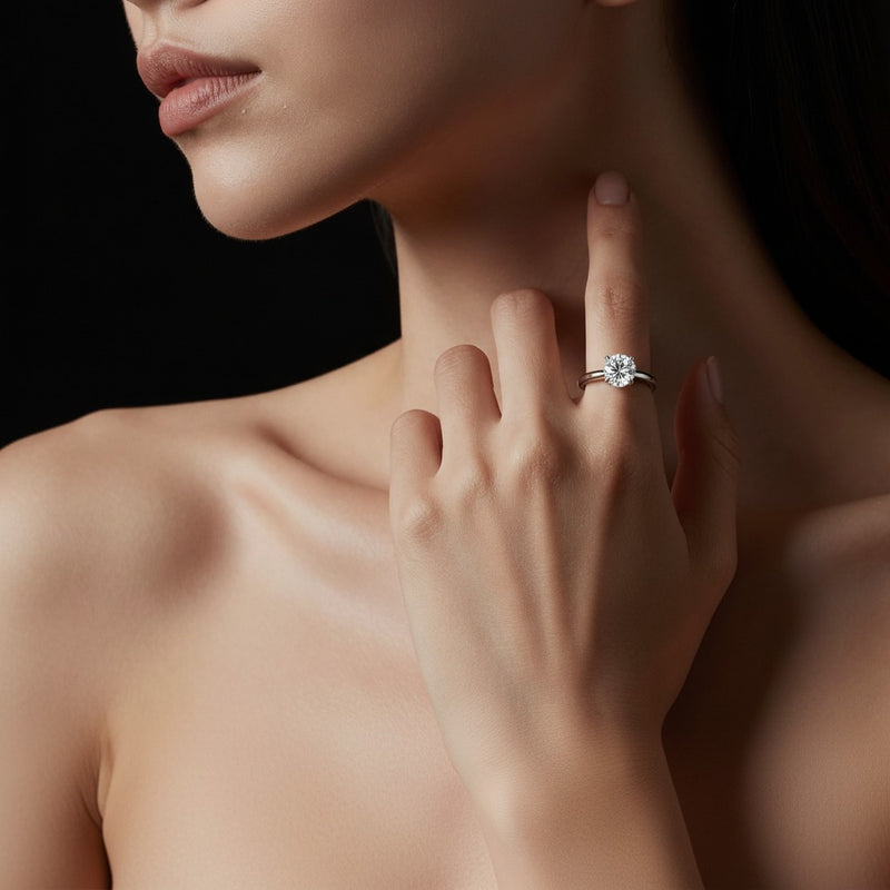 Model wearing round accented enagement ring