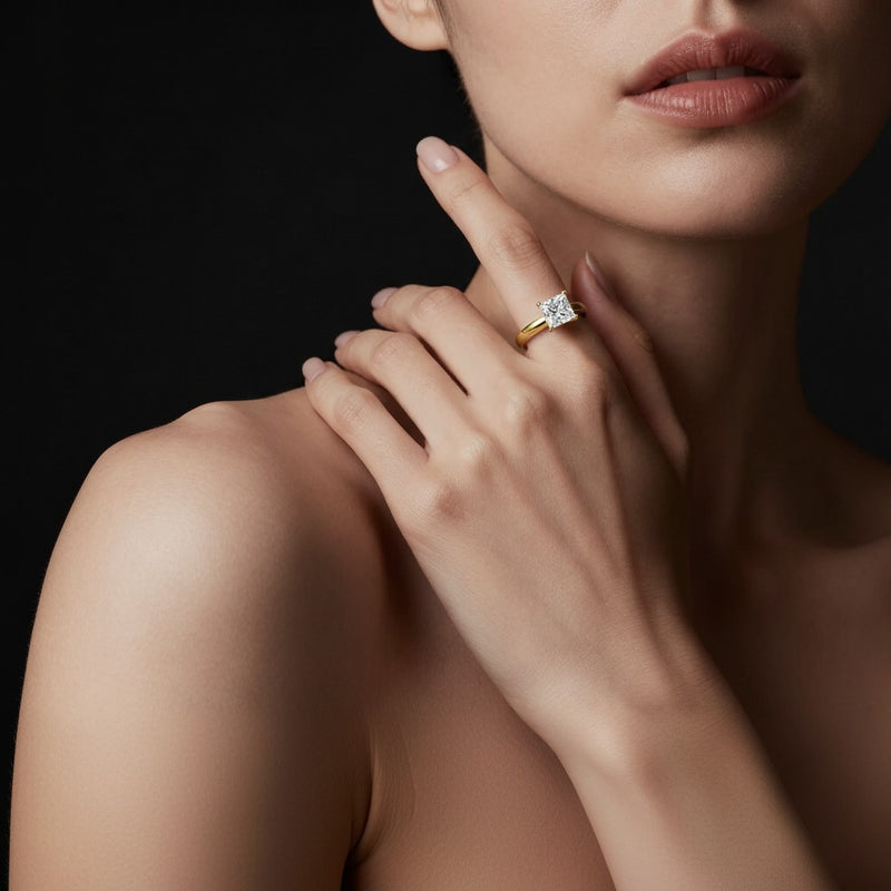 Model wearing princess two tone twisted basket cathedral shank solitaire ring
