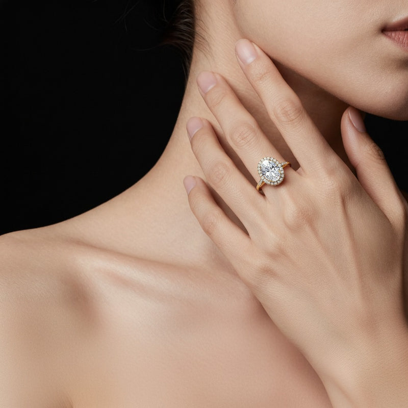 Model wearing oval bold accented engagement ring