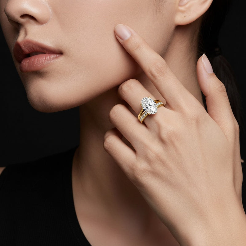 Model wearing oval channel set bridal engagement ring