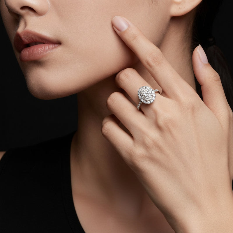 Model wearing oval bold classic engagement ring