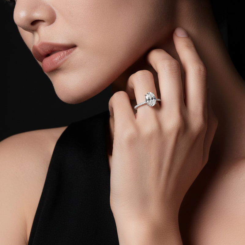 Model wearing oval three row micro pave engagement ring