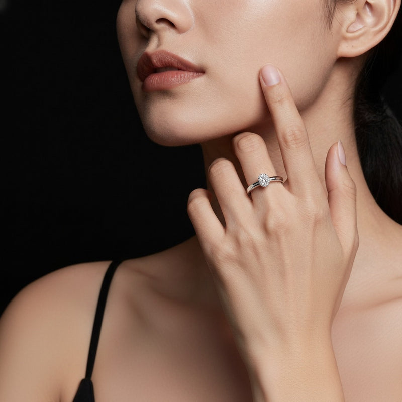 Model wearing oval accented bridge shank engagement ring